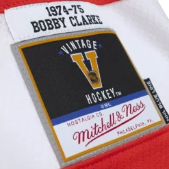 Jerseys Mitchell & Ness -Blue Line Bobby Clarke Philadelphia Flyers 1974 Jersey